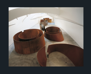 Richard Serra Escultura Torqued Ellipses.png